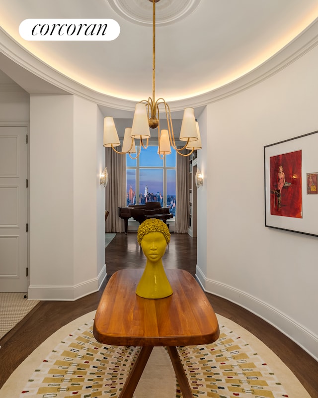 30 Park Pl Unit Ph77A, New York City, NY 10007 - hall featuring a chandelier, wood finished floors, and baseboards