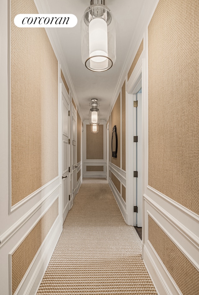 30 Park Pl Unit Ph77A, New York City, NY 10007 - hall with a decorative wall, crown molding, and light carpet