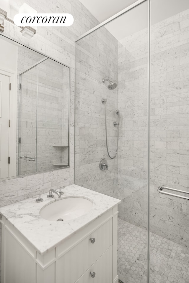 30 Park Pl Unit Ph77A, New York City, NY 10007 - full bathroom featuring a shower stall and vanity