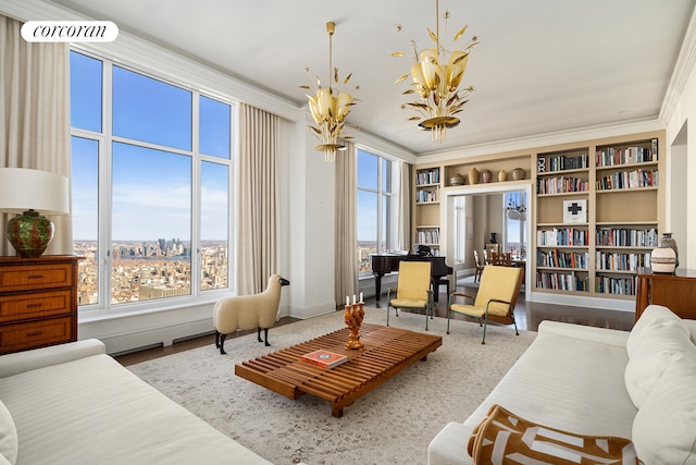 30 Park Pl Unit Ph77A, New York City, NY 10007 - living area with a chandelier, healthy amount of natural light, ornamental molding, wood finished floors, and built in features