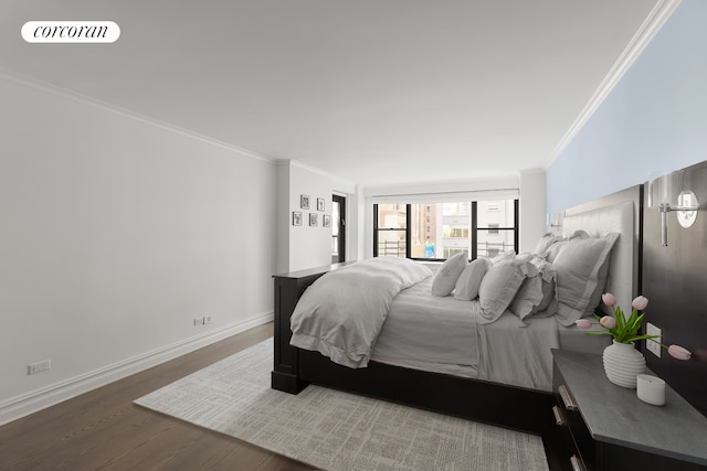 301 E 64th St Unit 7D, New York City, NY 10065 - bedroom with crown molding, wood finished floors, and baseboards