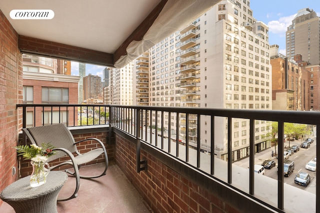 balcony featuring a city view
