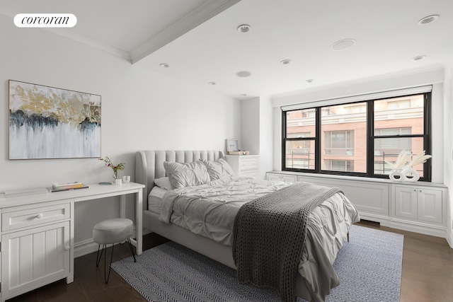 bedroom featuring crown molding and dark wood-style flooring