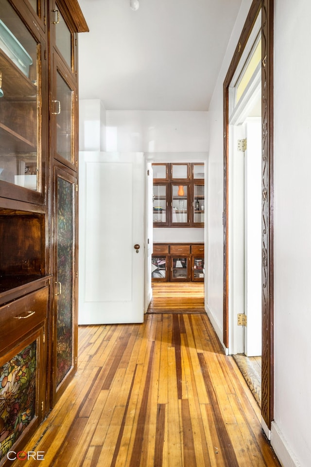 corridor featuring light wood-type flooring