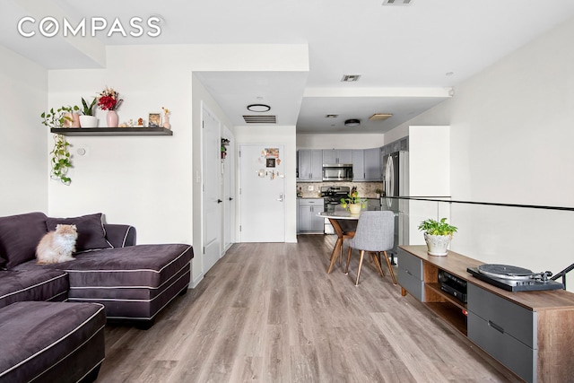 living room featuring light wood-type flooring