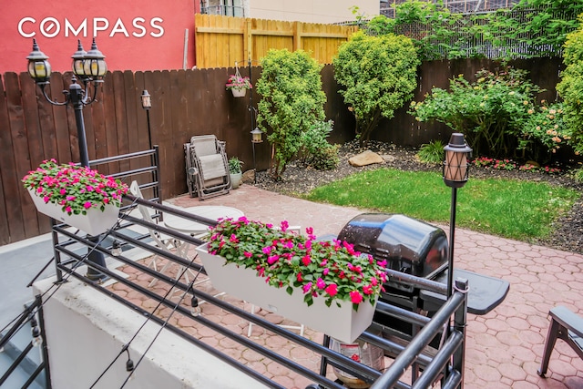 893 Myrtle Ave Unit 1B, New York City, NY 11206 - fenced backyard featuring a patio area