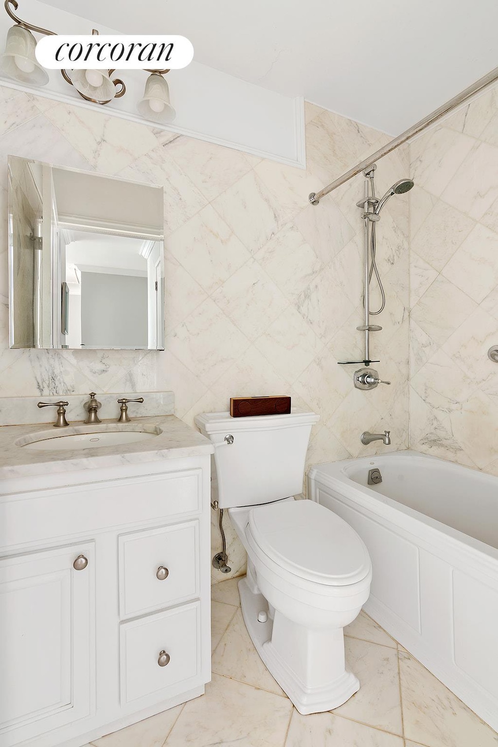 full bathroom featuring tile walls, toilet, shower / bath combination, and vanity
