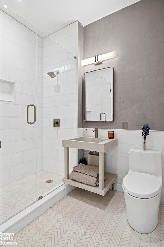 252 7th Ave Unit 3F, New York City, NY 10001 - full bath featuring a shower stall, tile patterned flooring, and tile walls