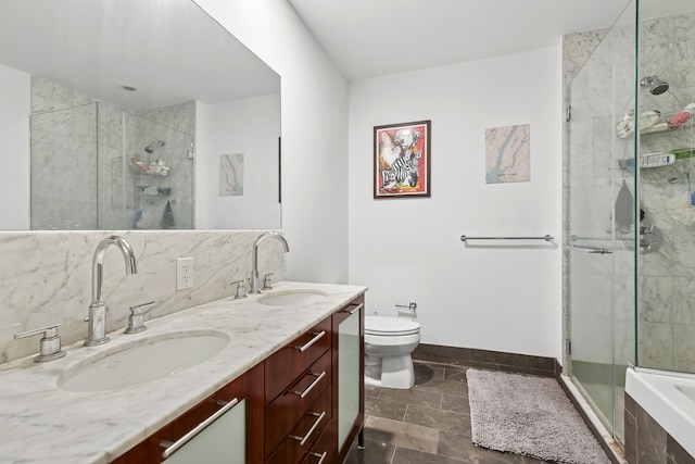100 Jay St Unit 4M, New York City, NY 11201 - bathroom featuring double vanity, a shower stall, toilet, baseboards, and a tub
