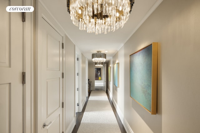 30 Park Pl Unit 68A, New York City, NY 10007 - hall with a chandelier, ornamental molding, carpet, and baseboards
