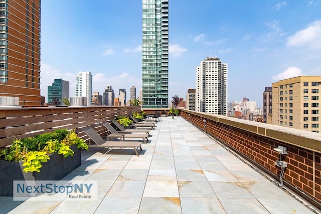 view of patio with a view of skyline