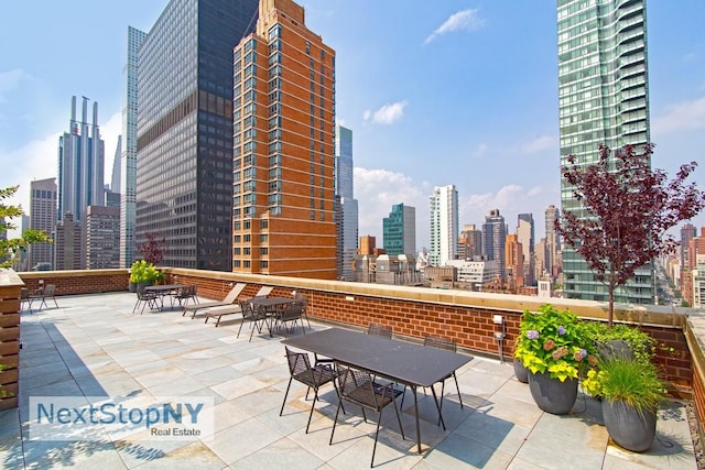 view of patio / terrace with a view of skyline