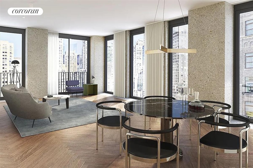 dining room with healthy amount of natural light and a city view