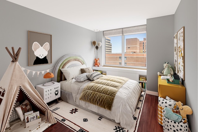 200 E 89th St Unit 27D, New York City, NY 10128 - bedroom with wood finished floors