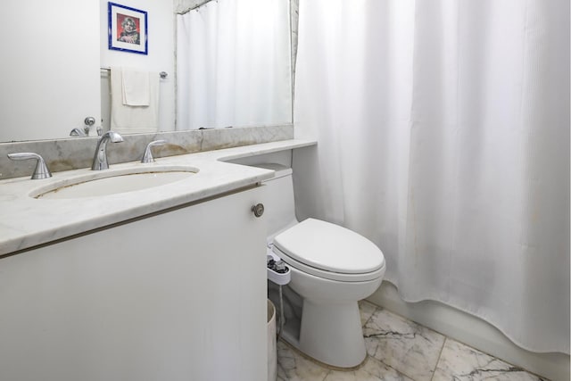 200 E 89th St Unit 27D, New York City, NY 10128 - bathroom with marble finish flooring, vanity, and toilet