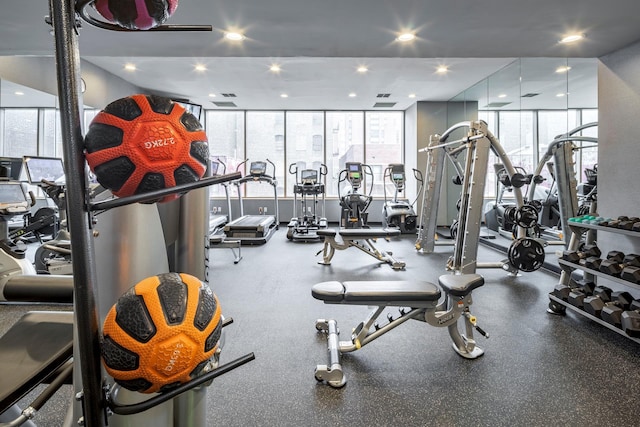 200 E 89th St Unit 27D, New York City, NY 10128 - exercise room with floor to ceiling windows and recessed lighting
