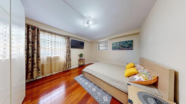 97-40 62nd Dr Unit 9K, New York City, NY 11374 - bedroom with wood finished floors