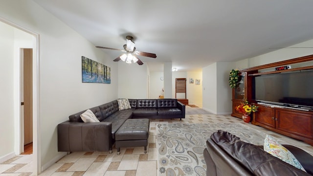 97-40 62nd Dr Unit 9K, New York City, NY 11374 - living room featuring ceiling fan and baseboards