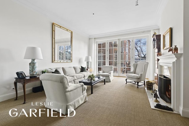 15 Sutton Place, New York City, NY 10022 - carpeted living area with crown molding, a high end fireplace, and baseboards