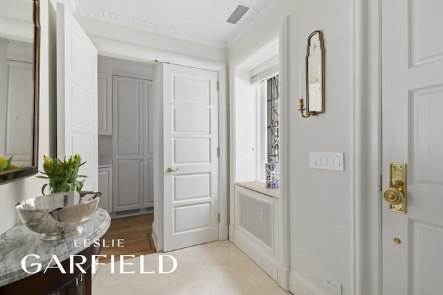 15 Sutton Place, New York City, NY 10022 - hall with light tile patterned floors and crown molding