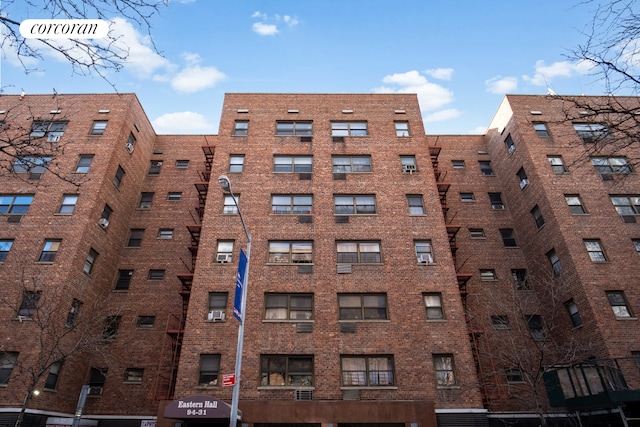 view of apartment building / complex featuring cooling unit