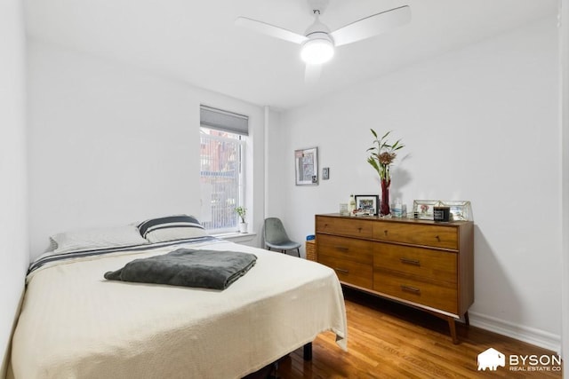 317 E 3rd St Unit 8, New York City, NY 10009 - bedroom featuring wood finished floors and a ceiling fan