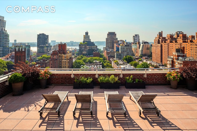 view of patio featuring a skyline view