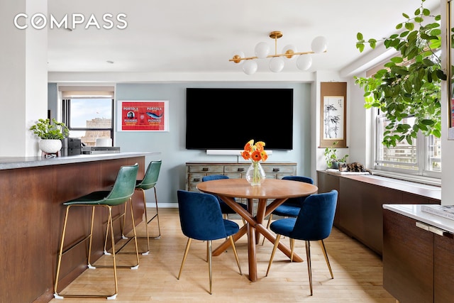 360 W 22nd St Unit 12B, New York City, NY 10011 - dining area with light wood-style flooring