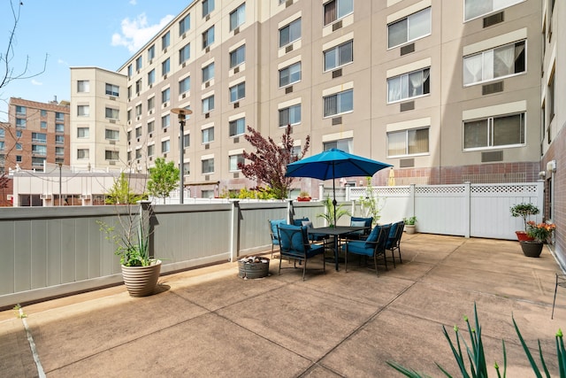 view of patio / terrace with fence and outdoor dining area