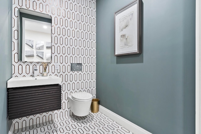 78-29 Austin St Unit Th-1, New York City, NY 11375 - bathroom featuring toilet, vanity, tile patterned floors, and baseboards