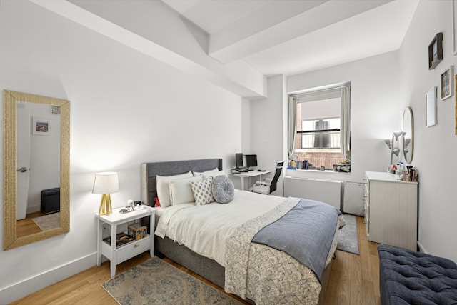 99 John St Unit 205, New York City, NY 10038 - bedroom with light wood-type flooring and an office area