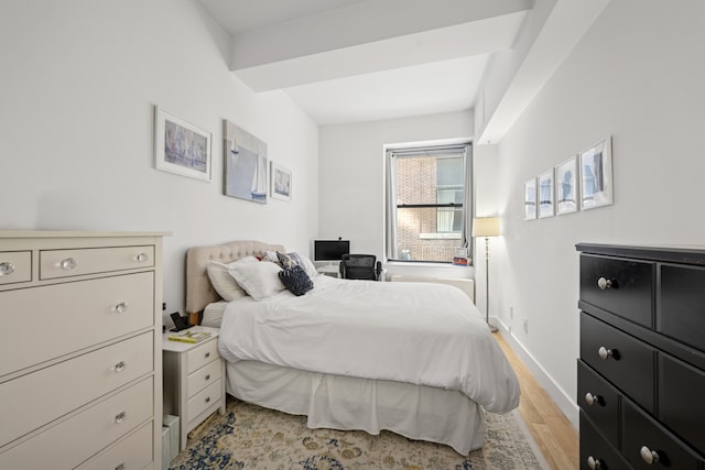 99 John St Unit 205, New York City, NY 10038 - bedroom featuring light wood-style flooring and baseboards