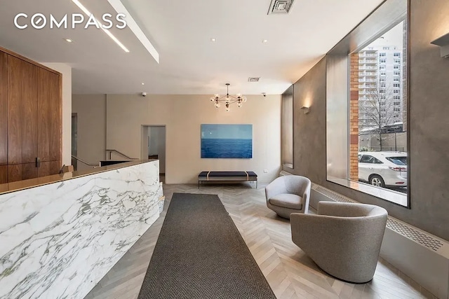 250 Mercer St Unit C308, New York City, NY 10012 - reception area with a chandelier