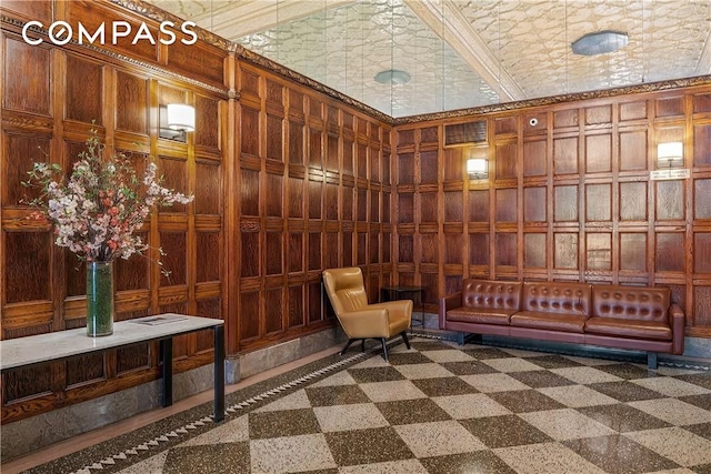 community lobby featuring wooden walls