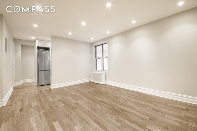 156-08 Riverside Dr W Unit 1K, New York City, NY 10032 - empty room with light wood finished floors and recessed lighting