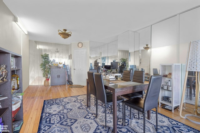 dining area with light wood finished floors