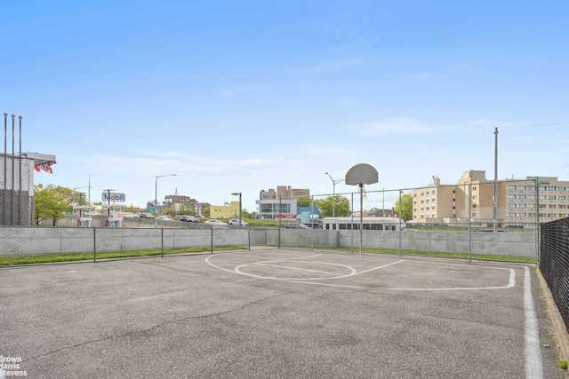 view of sport court with fence and community basketball court