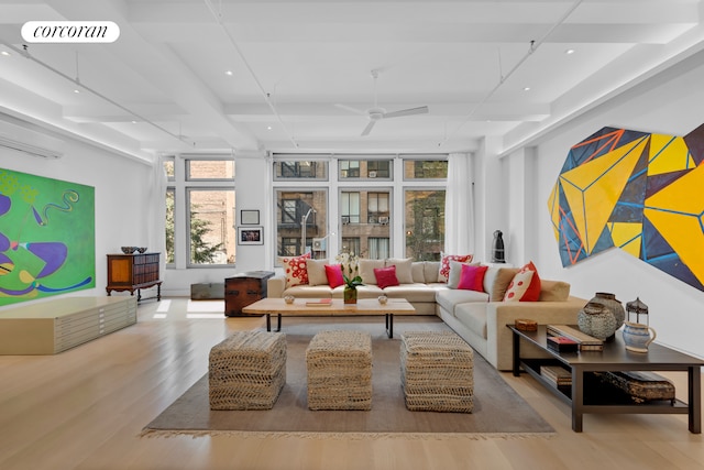 living room with wood finished floors, recessed lighting, a ceiling fan, and beam ceiling