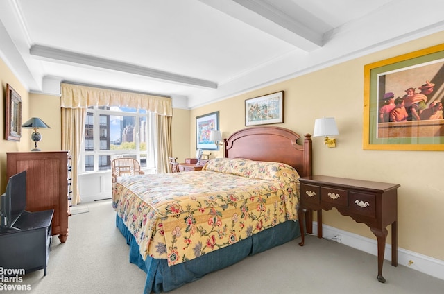 bedroom with carpet flooring and beam ceiling