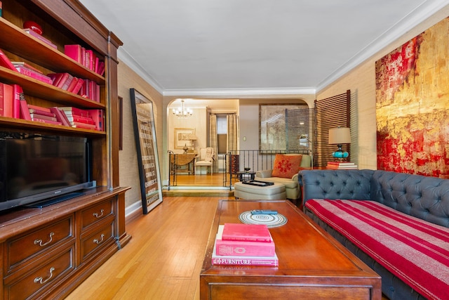 125 W 96th St Unit 1A, New York City, NY 10025 - living room with a chandelier, light wood-type flooring, crown molding, and baseboards