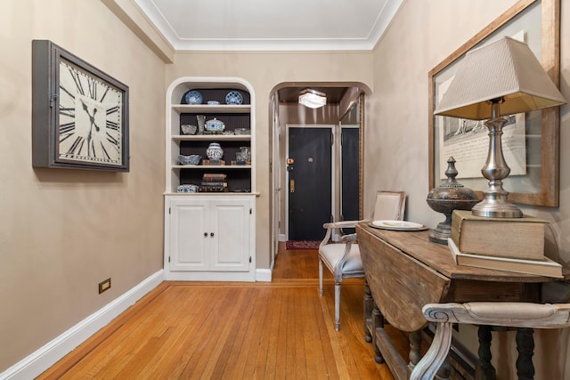 125 W 96th St Unit 1A, New York City, NY 10025 - entryway with light wood-type flooring, ornamental molding, arched walkways, and baseboards