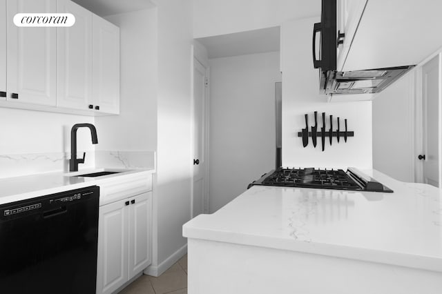 235 W 102nd St Unit 17F, New York City, NY 10025 - kitchen with dishwasher, stovetop, white cabinets, and light stone countertops