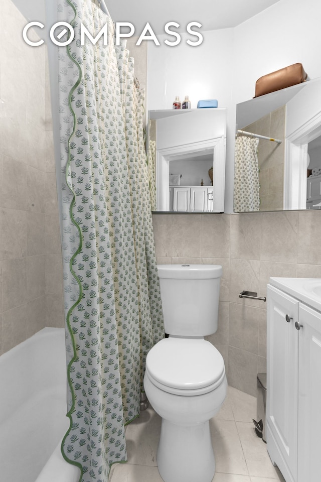 139 N 8th St, New York City, NY 11249 - bathroom with vanity, tile walls, shower / bathtub combination with curtain, toilet, and tile patterned flooring