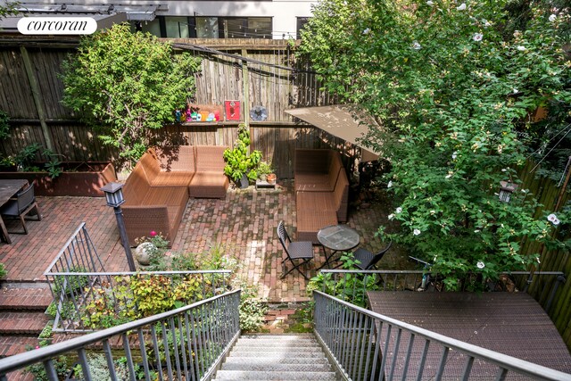 balcony featuring a patio area and an outdoor living space