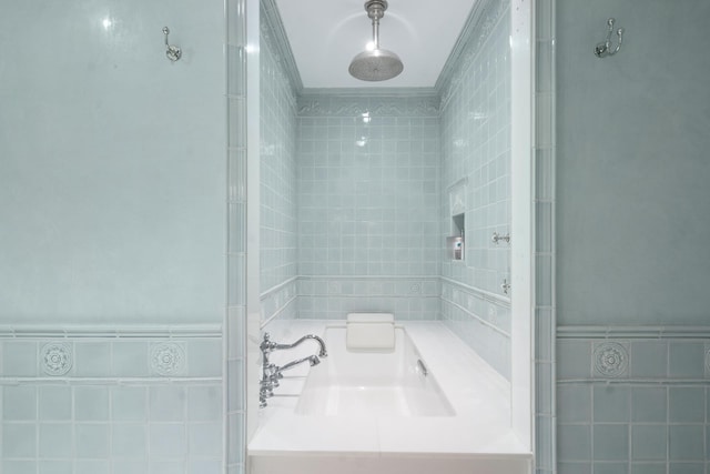 415 E 54th St Unit 25Gg, New York City, NY 10022 - bathroom featuring tile walls and a shower