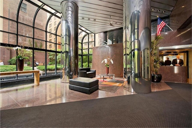 415 E 54th St Unit 25Gg, New York City, NY 10022 - community lobby with a towering ceiling