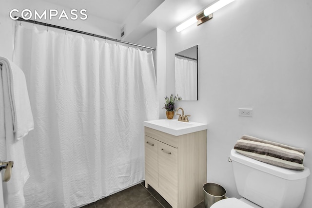 2235 Frederick Douglass Blvd Unit 2L, New York City, NY 10027 - bathroom with vanity, tile patterned floors, toilet, and a shower with curtain