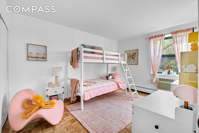 2235 Frederick Douglass Blvd Unit 2L, New York City, NY 10027 - bedroom with a baseboard radiator