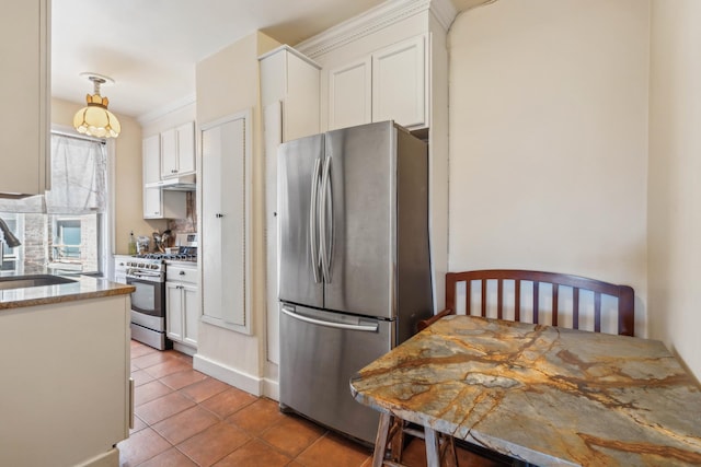 1075 Grand Concourse Unit 4G, New York City, NY 10452 - kitchen featuring appliances with stainless steel finishes, a sink, white cabinetry, and under cabinet range hood