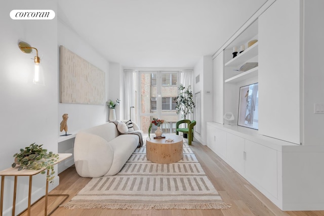 sitting room featuring light wood-type flooring